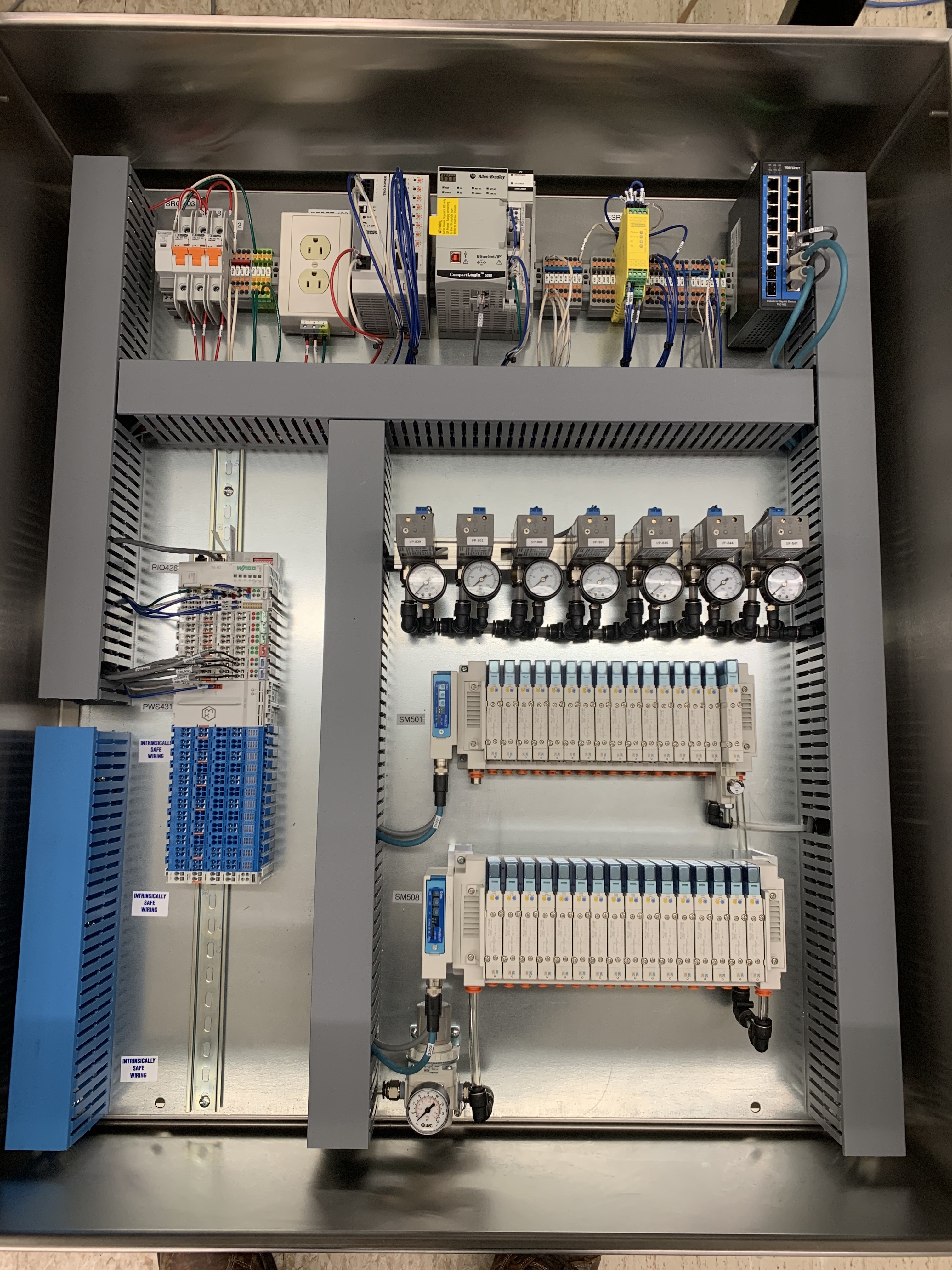 Distillery control panel with Allen-Bradley PLC, Intrinsic Safe Barriers, SMC Solenoid Manifolds.